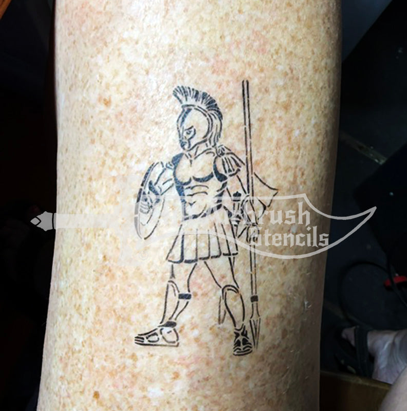 A temporary tattoo of a Spartan warrior holding a spear and shield.