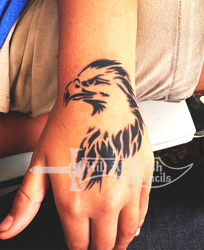 A hand airbrushed with a patriotic eagle tattoo created with a stencil from Hilt Airbrush Stencils.