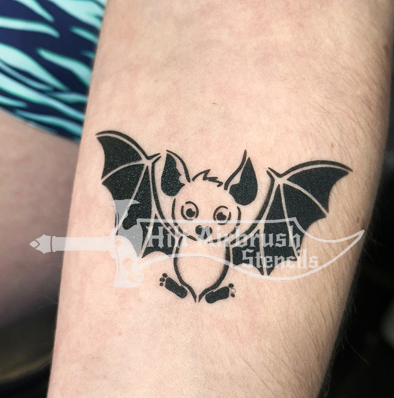 Bat tattoo on a person's arm made with a Hilt Airbrush Tattoos stencil
