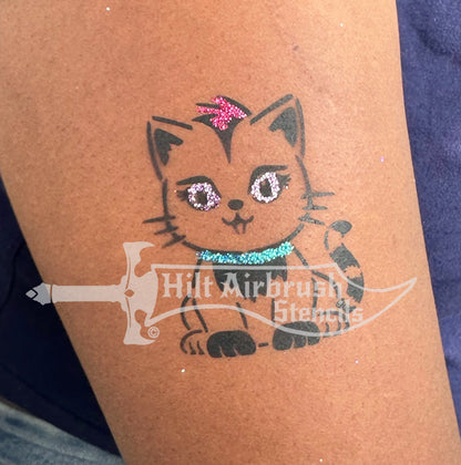 Tattoo of a cat airbrushed on a person's arm, created with Hilt Airbrush stencils
