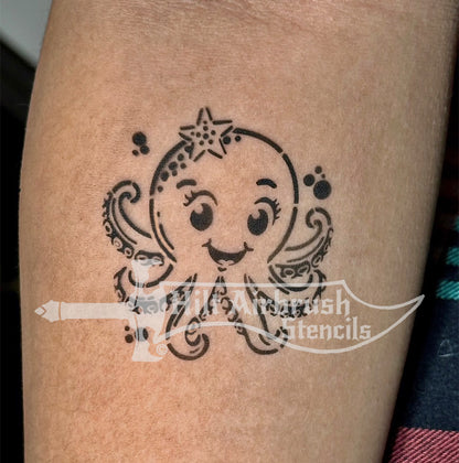 An octopus airbrush tattoo on a child's arm created with a stencil from Hilt Airbrush Stencils.
