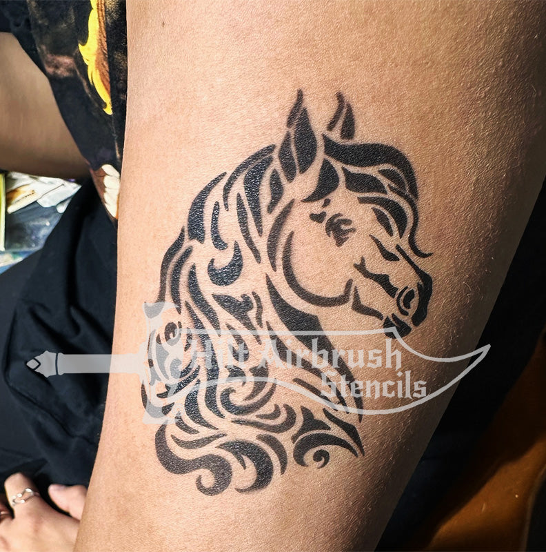 Airbrush tattoo of a fancy horse head design on skin created with a Hilt Airbrush Tattoo Stencils.