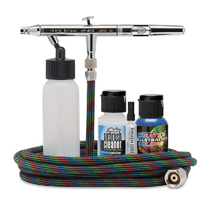 Iwata Airbrush kit with airbrush, bottles, and hose for airbrush tattooing.